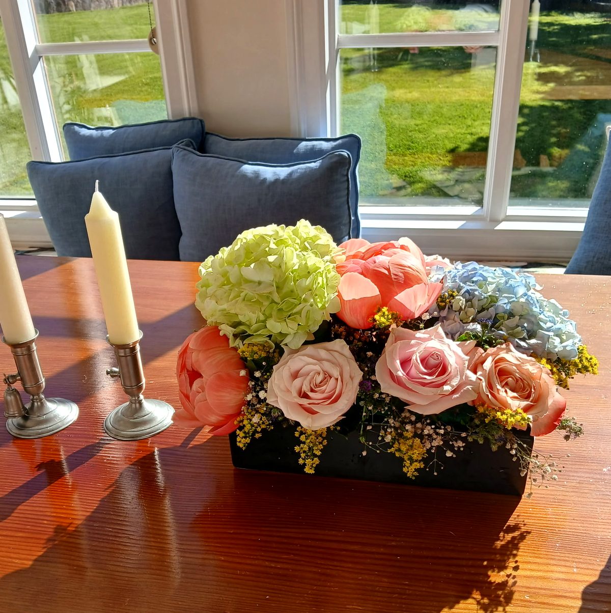 Pastel garden-style arrangement in natural light